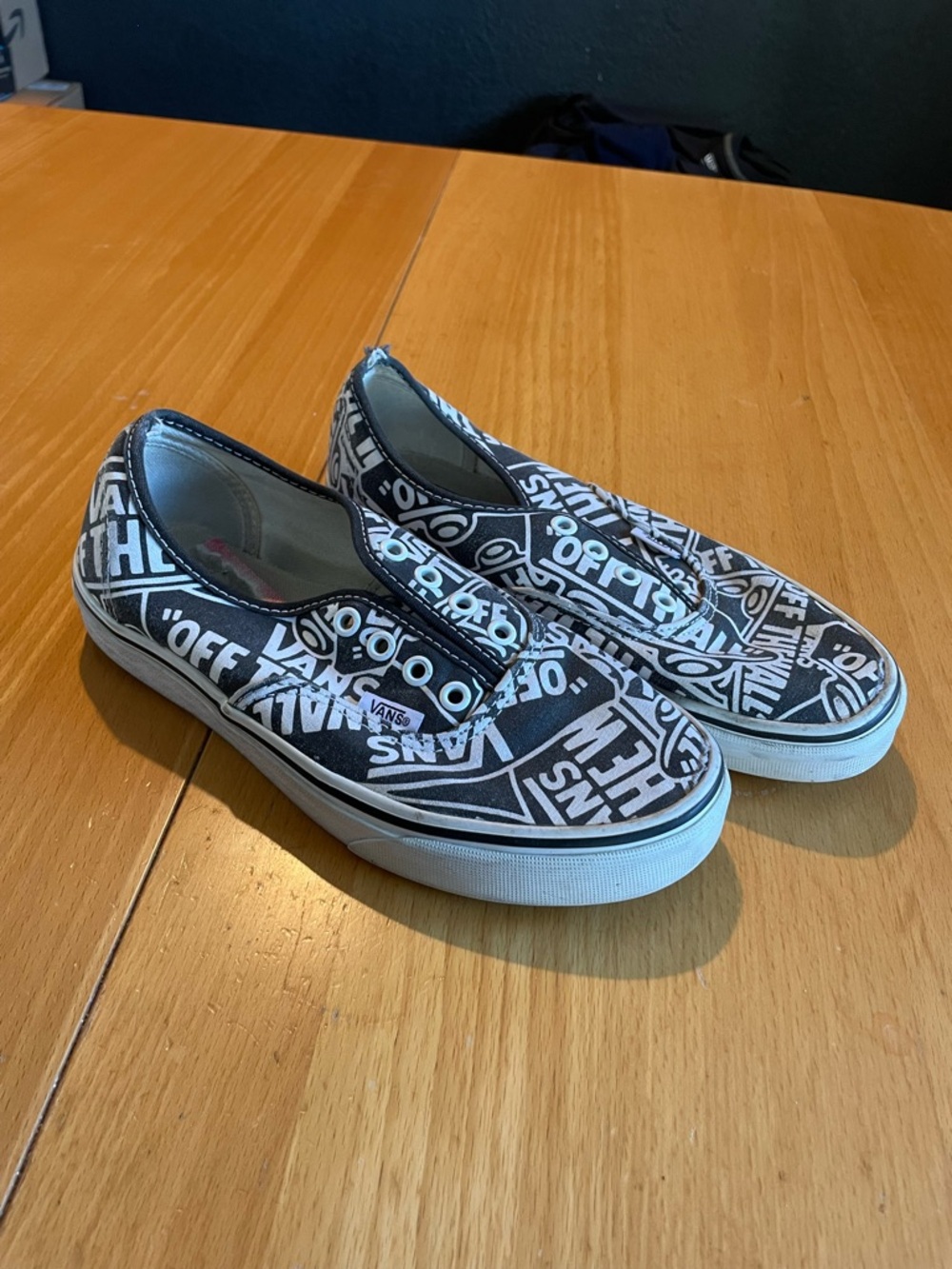 Vans Black and White Off the all Logo Sneakers